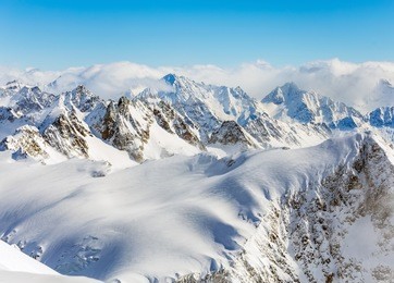a wintertime view from mt. titlis in switzerland. the titlis is a mountain, located on the border between the swiss cantons of obwalden and bern, it is usually accessed from the town of engelberg.