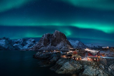 fisherman village with aurora in the background  travel concept world explore northern light