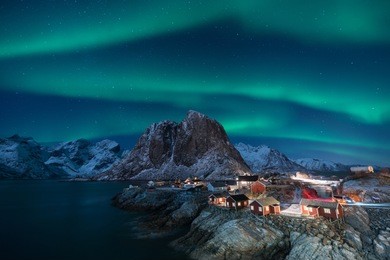 fisherman village with aurora in the background  travel concept world explore northern light