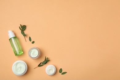flat lay composition with cosmetic products on color background