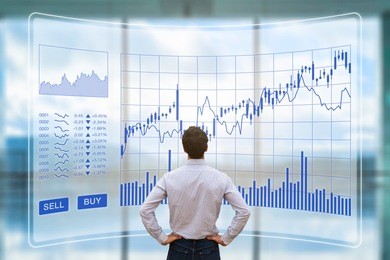 trader analyzing forex (foreign exchange) trading charts with sell buy buttons on screen interface, financial technology (fintech) stock market concept, return on investment