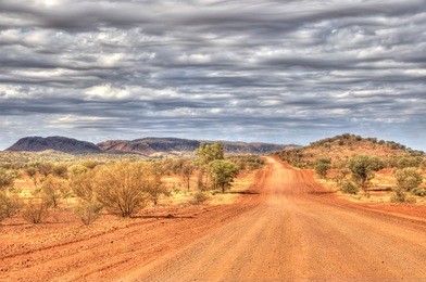outback travel, red centre of australia, dirt road near hermannsburg/alice springs, northern territory, australia