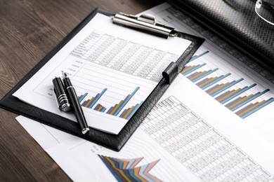 
financial printed paper charts, graphs and diagrams. science and technology. 