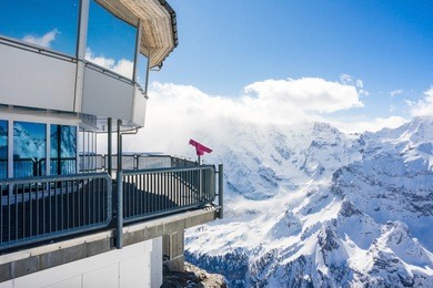 stunning panoramic view snow moutain of the swiss skyline from schilthorn, switzerland