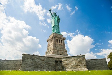 statue of liberty against the blue sky