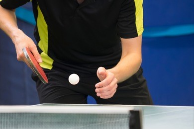 table tennis player serving