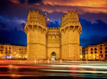 old city gate in valencia on night time, spain, europe