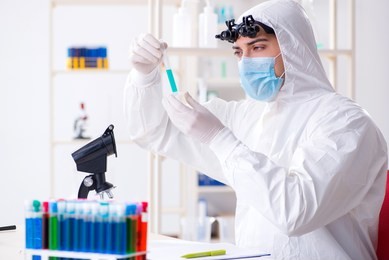 young chemical scientist working in lab