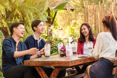 group of friends hang out in cafe have fun together