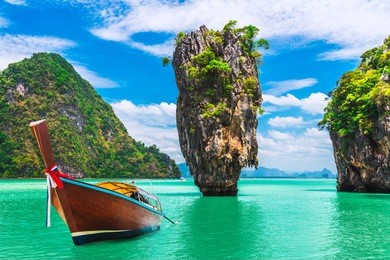 landscape of amazing james bond island with longtail boat waiting for traveler on tropical sea beac, near phuket, travel nature adventure thailand, destination place asia, summer holiday vacation trip