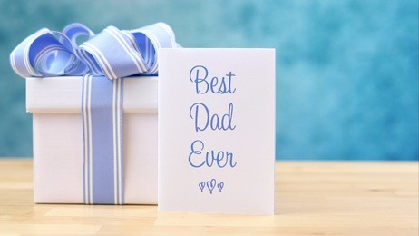 happy father's day close up of best dad ever greeting card and gift with copy space.