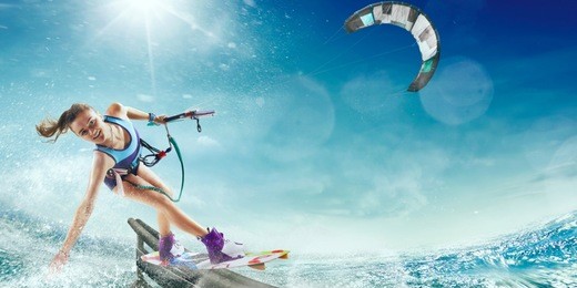 kitesurfing. girl rides a kite