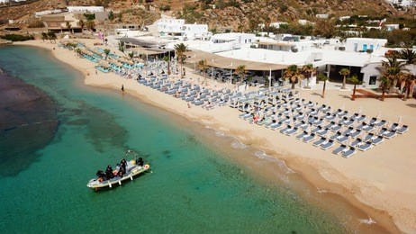 aerial drone photo of famous clear water beach of paradise in iconic island of mykonos, cyclades, greece