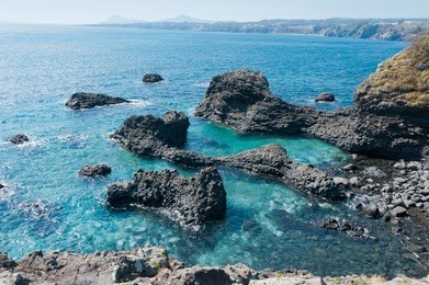 jungmun daepo haean jusangjeollidae at jeju island - the largest pillar rock formation in korea