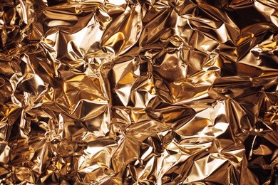 full frame take of a sheet of crumpled silver aluminum foil background