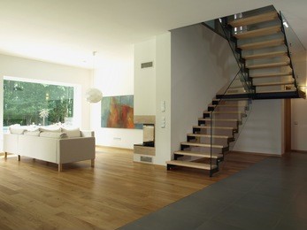 contemporary house: staircase and a living room
