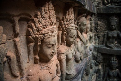 the beautiful bas relief in the hidden terrace of the terrace of the leper king in royal square of angkor thom, cambodia.
