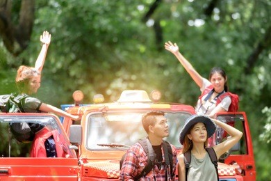 group of young asian camper enjoy adventure travel in forest .travel concept .