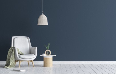 chair with lamp and coffee table in living room interior, dark blue wall mock up background, 3d render