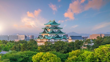 nagoya castle and city skyline in japan at sunset