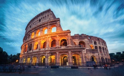 colosseum in rome, italy - long exposure shot. the rome colosseum was built in the time of ancient rome in the city center. it is the main travel destination and tourist attraction of italy.