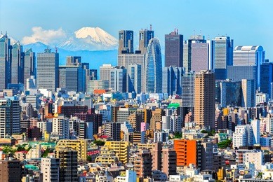 tokyo, shinjuku building cityscape and mt. fuji at behind.