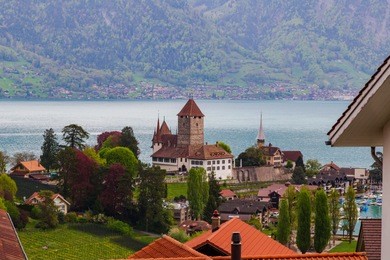 spiez old castle in bern switzerland near lake thun and mountain