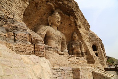 buddha statue, yungang cave grottoes, datong, china/world heritage unesco