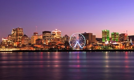 montreal skyline at dusk and saint lawrence river in quebec, canada