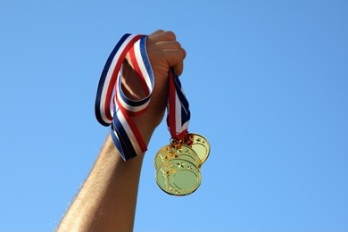 winning gold medals