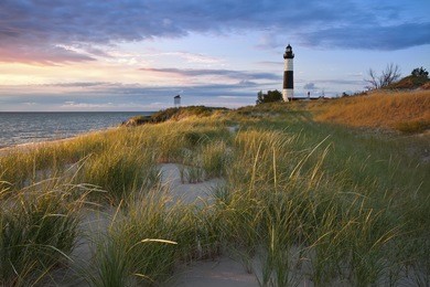 big sable point lighthouse. image of the big sable point lighthouse and the lake michigan shoreline, michigan, usa.
