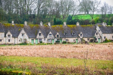 traditional cotswold stone cottages, arlington row, bibury, gloucestershire, england