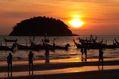 sunset kata beach, phuket, thailand