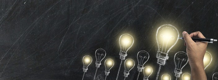 hand writing with chalk on blackboard business and school or strategy concept design ,white chalk to write something on black board for time line cover or website background, with copy space for text.