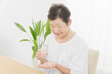 asian woman having the medicine