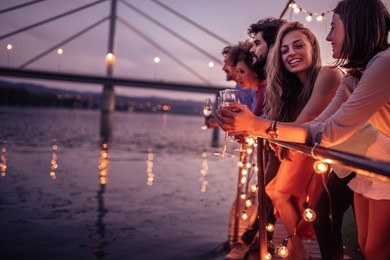 group of friends relaxing on a boat cruise