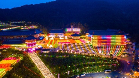 aerial view of samgwangsa temple at nighttime in busan city, south korea.thousands of paper lanterns decorate samgwangsa temple in busan city of south korea for buddha's birthday.