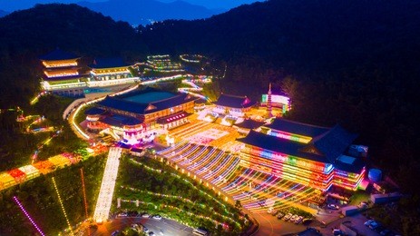 aerial view of samgwangsa temple at nighttime in busan city, south korea.thousands of paper lanterns decorate samgwangsa temple in busan city of south korea for buddha's birthday.