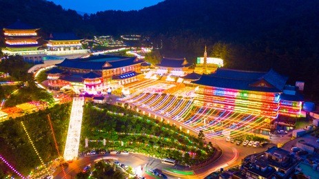aerial view of samgwangsa temple at nighttime in busan city, south korea.thousands of paper lanterns decorate samgwangsa temple in busan city of south korea for buddha's birthday.