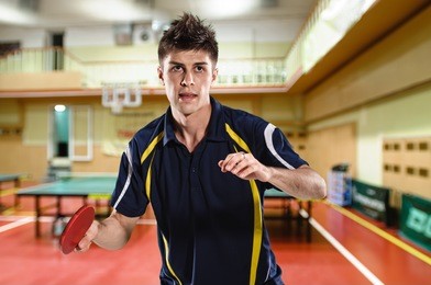 young man tennis-player in play on chroma key