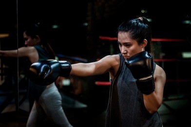 muay thai training girl with film grain and underexposure
