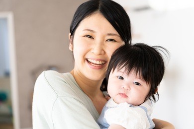 portrait of asian mother in living room
