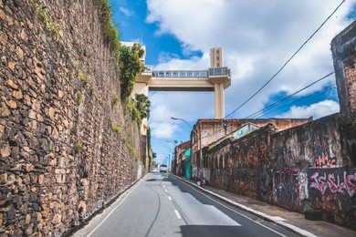 view of lacerda elevator and all saints bay (baia de todos os santos) in salvador, bahia, brazil.