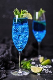 cocktail glass with the blue hawaii. blue hawaiian alcoholic cocktail
