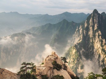 pavilion and beautiful scenery peaks and mist at at huashan mountain in shaanxi province, china.       