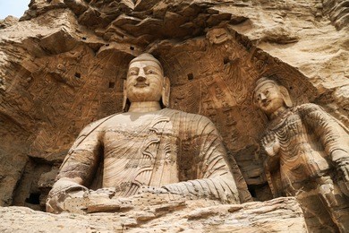 buddha statue, yungang cave grottoes, datong, china/world heritage unesco