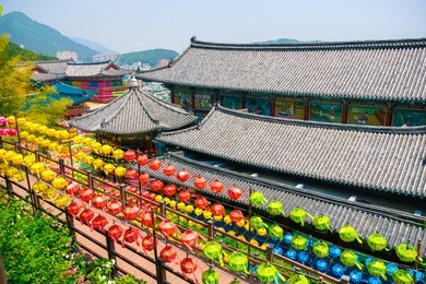 view of samgwangsa temple in busan city of south korea. thousands of paper lanterns decorate samgwangsa temple in busan, south korea for buddha's birthday.