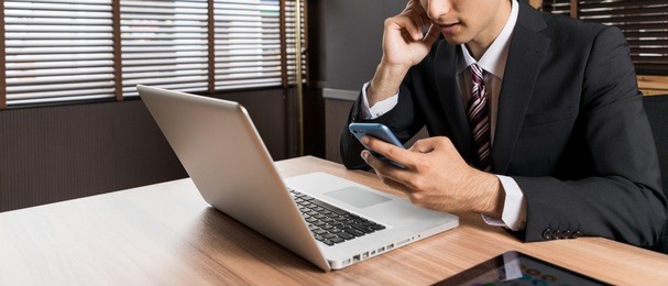 young businessman hands free calling with smart phone