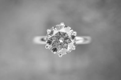 diamond ring or wedding ring for woman. focus within diamond.