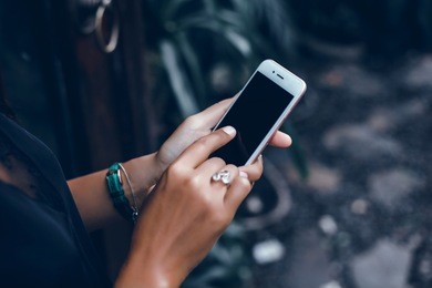 young pretty woman posing in the street with phone, outdoor portrait, hipster girls, sisters, chic, tablet, internet, using smartphone, close-up fashion model, post in instagram, facebook
